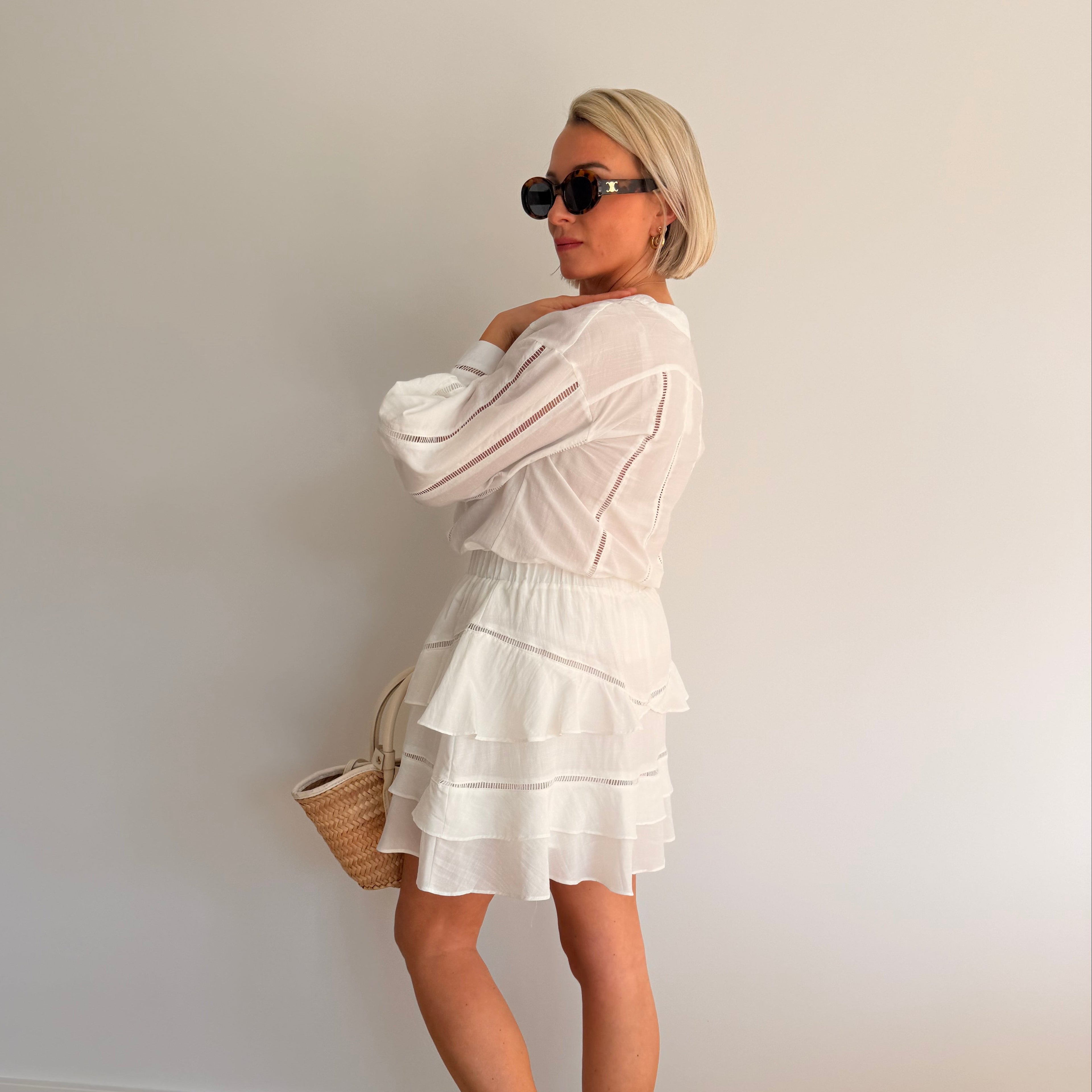 jupe blanche femme
jupe à volants femme
jupe fluide été femme
jupe courte élégante
jupe romantique femme
jupe taille élastique
tenue été chic femme
jupe légère femme