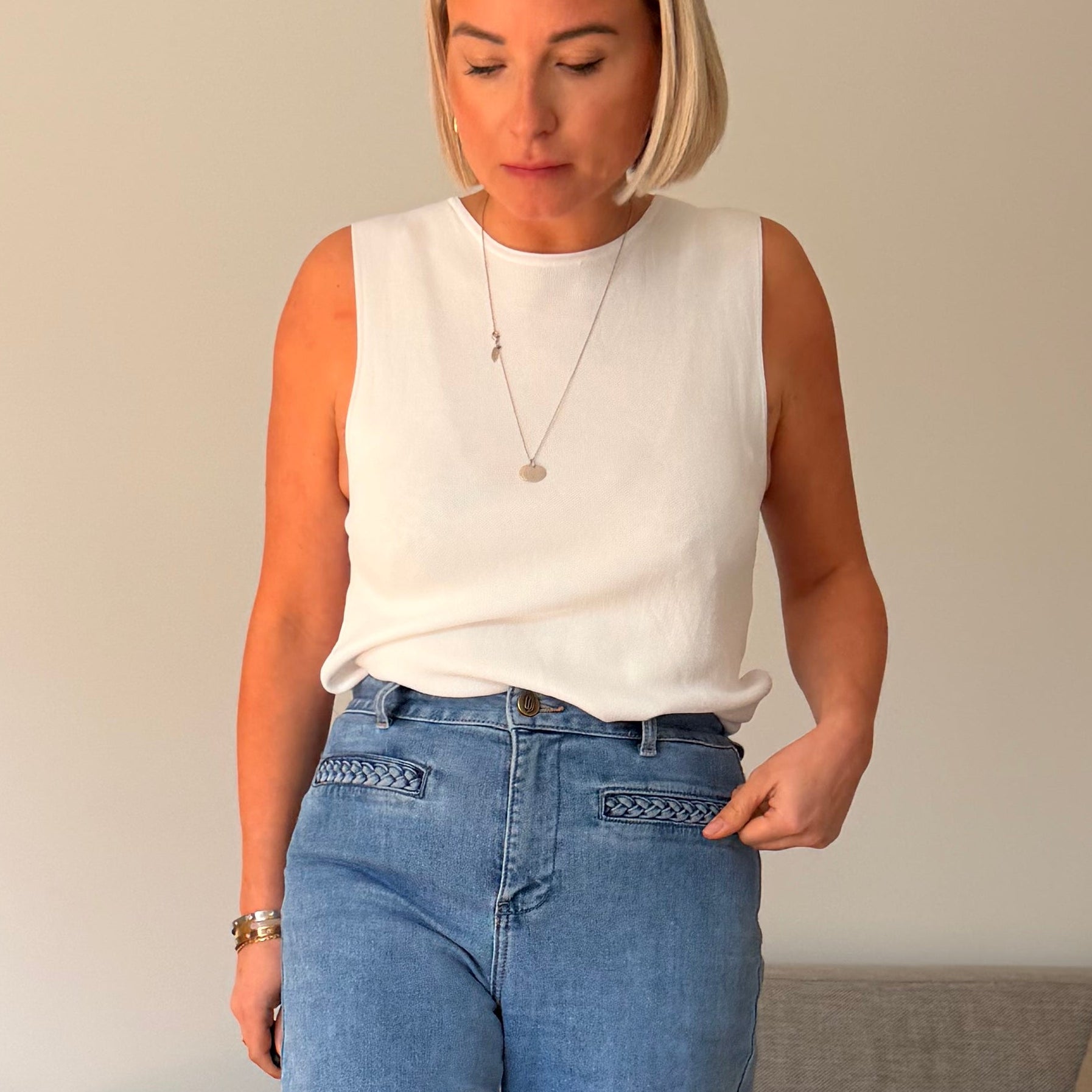 top blanc femme
top sans manches femme
top femme été
top élégant femme
top coupe évasée
look chic femme